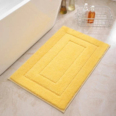 Tapis de bain jaune